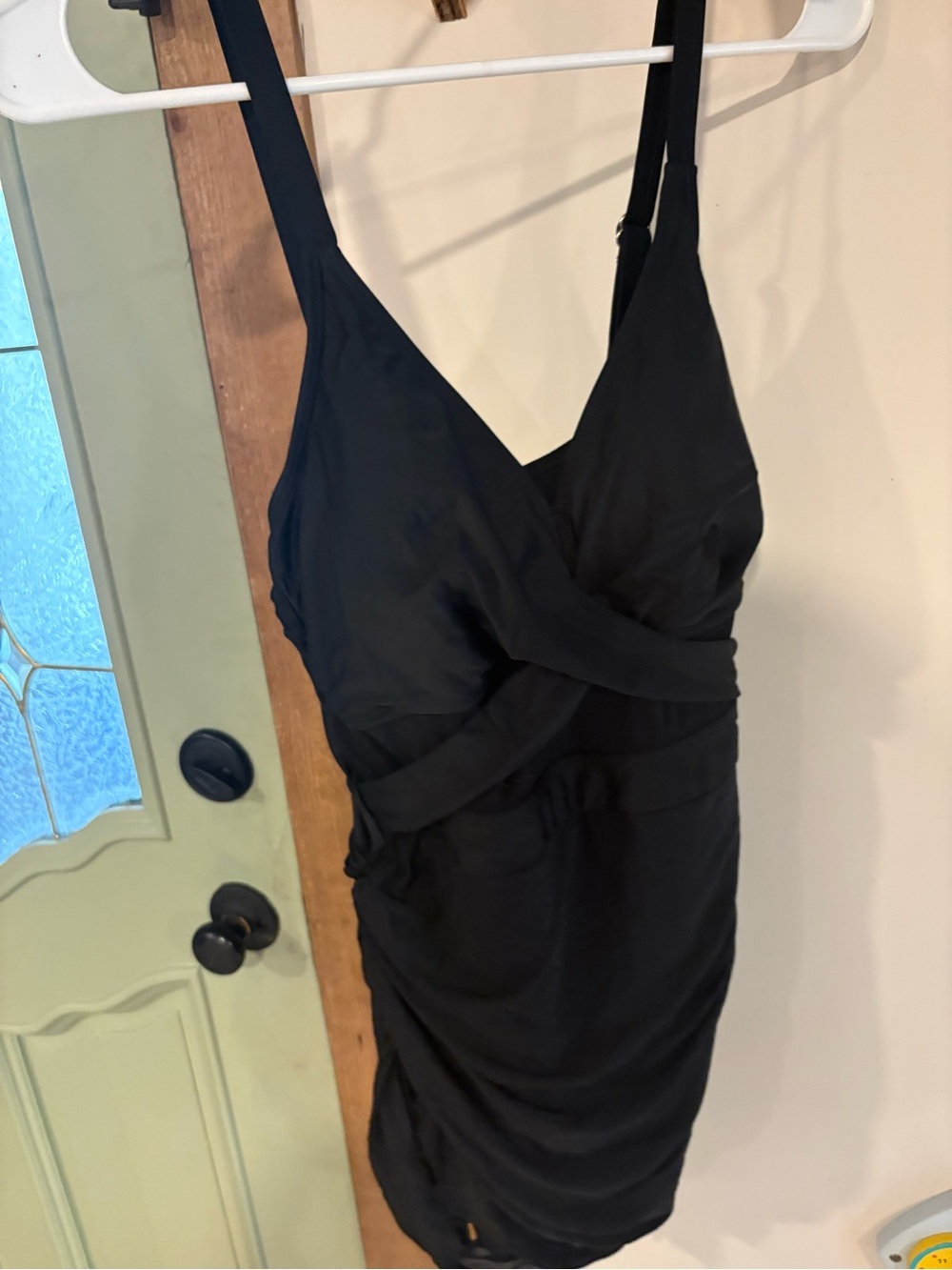 Sleek Black One-Piece Swimsuit with Twist Front and Sheer Panels